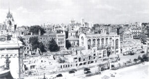 Aerial shot of the destroyed Crown Office Row revealing Temple Church and Royal Courts of Justice behind