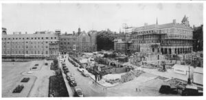 View of Crown Office Row cleared of debris. Rebuilding work can be seen on cloisters and Middle Temple Hall
