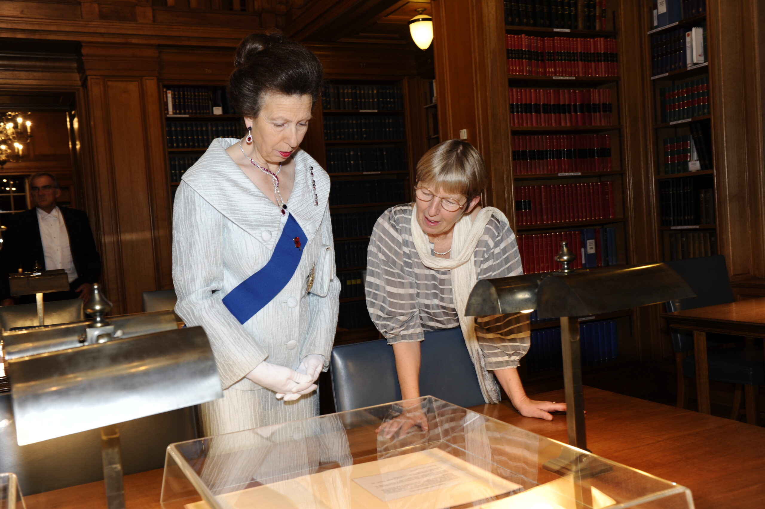 HRH The Princess Royal and the Librarian, look at a display in the Library on Grand Day, 2011