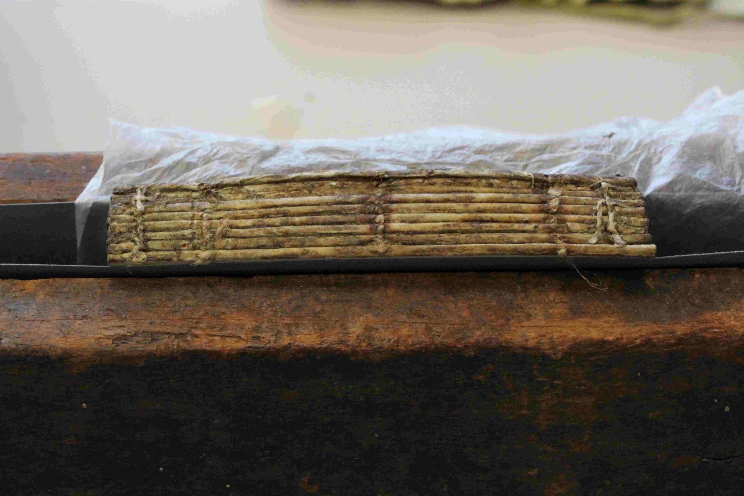 bound pages with stitching visible from the side