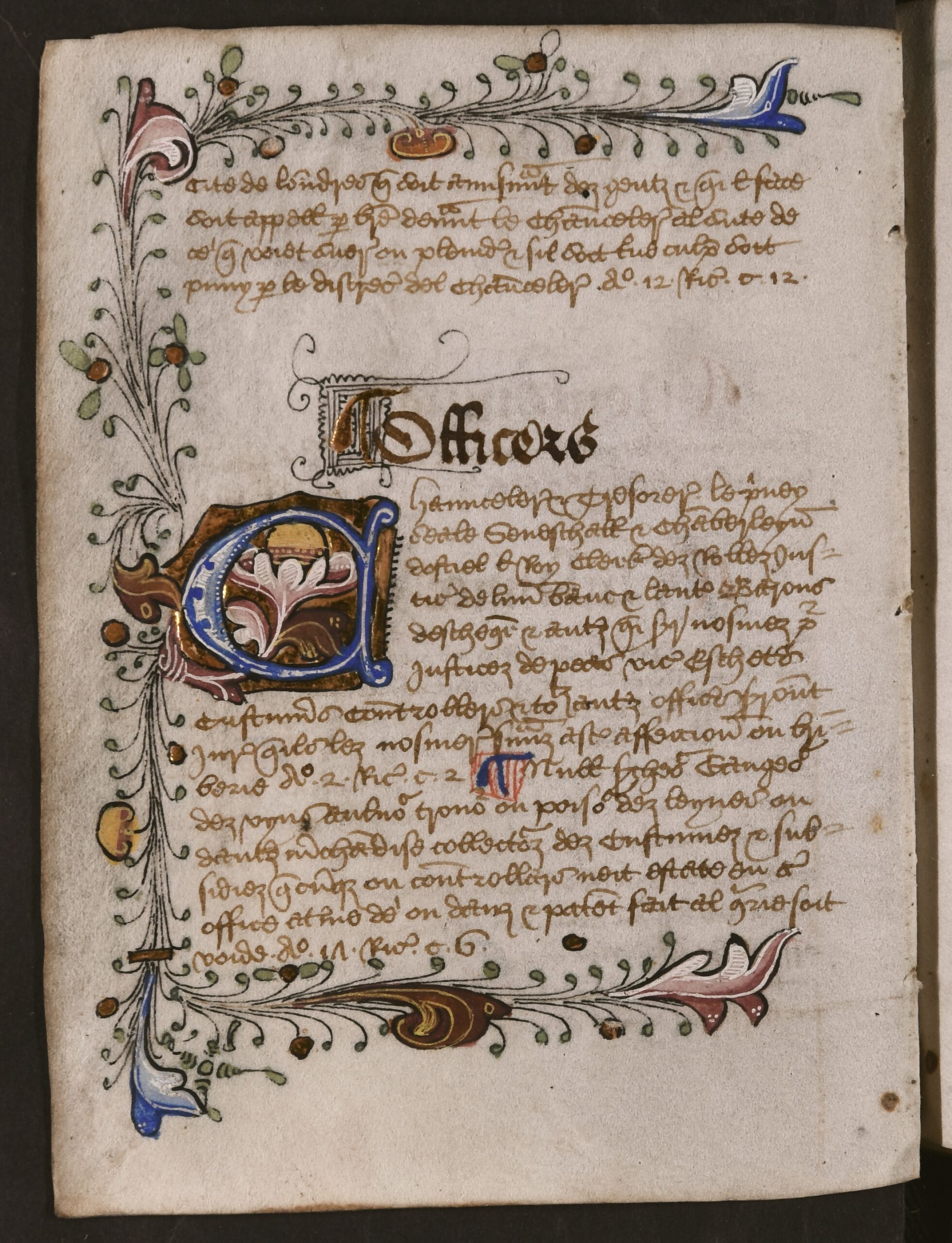 First letter of the first word in the new alphabetical section is presented within large blue, red, yellow, and gold illuminated capital letters, and are encased within colourful, illuminated illustrations, with leaves and foliage, that span the perimeter of the folio (except the gutter).